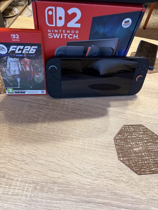 Nintendo Switch 2 + Mario Kart World + FC 26 + Кейс – Отлично състояние