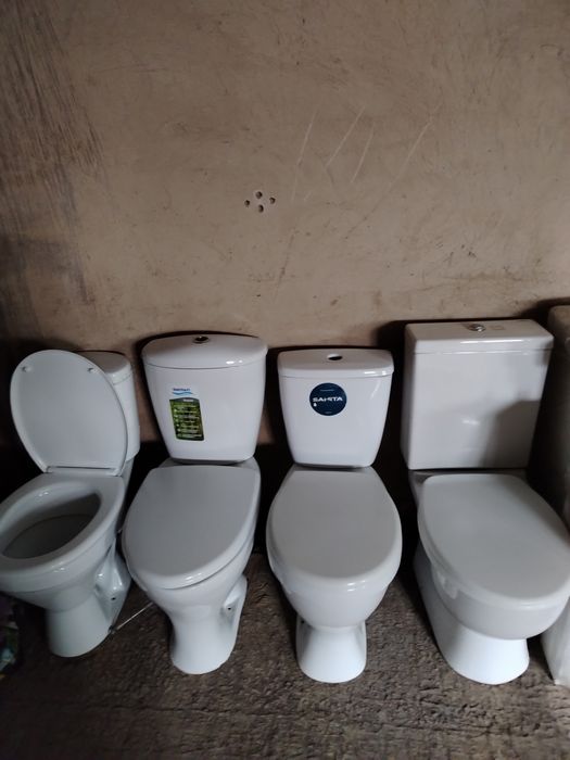 Продам  унитаз с бочком