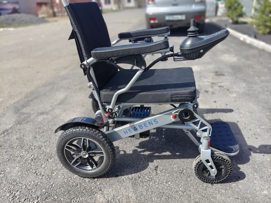 Нвалидная коляска с электроприводом.