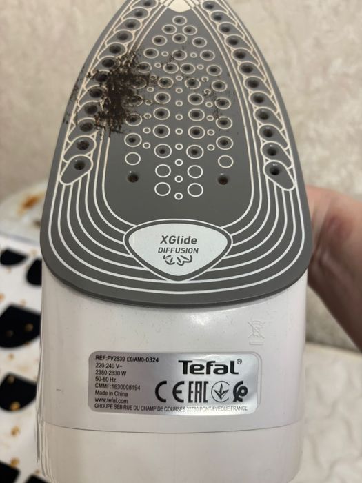 Гладильная доска с утюгом