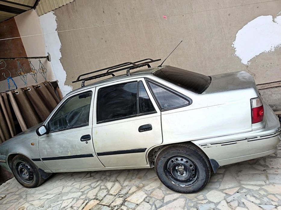 Nexia Dohc (kulrang rangli),holati yaxshi