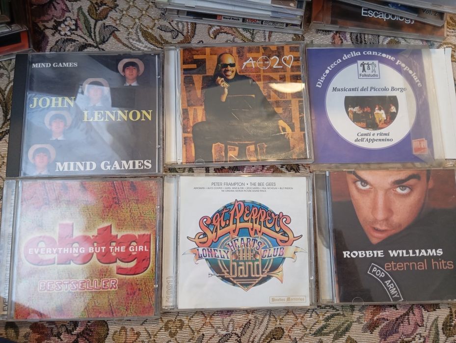 Cd дискове с рок музика и класика