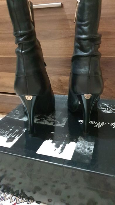 Продам новые сапоги!