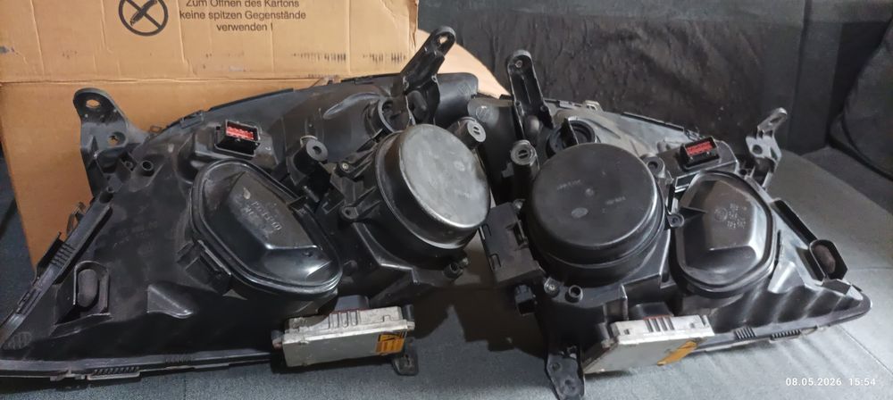 Продавам пълен комплект оригинални Ксенонови фарове HELLA за Opel Vectra C