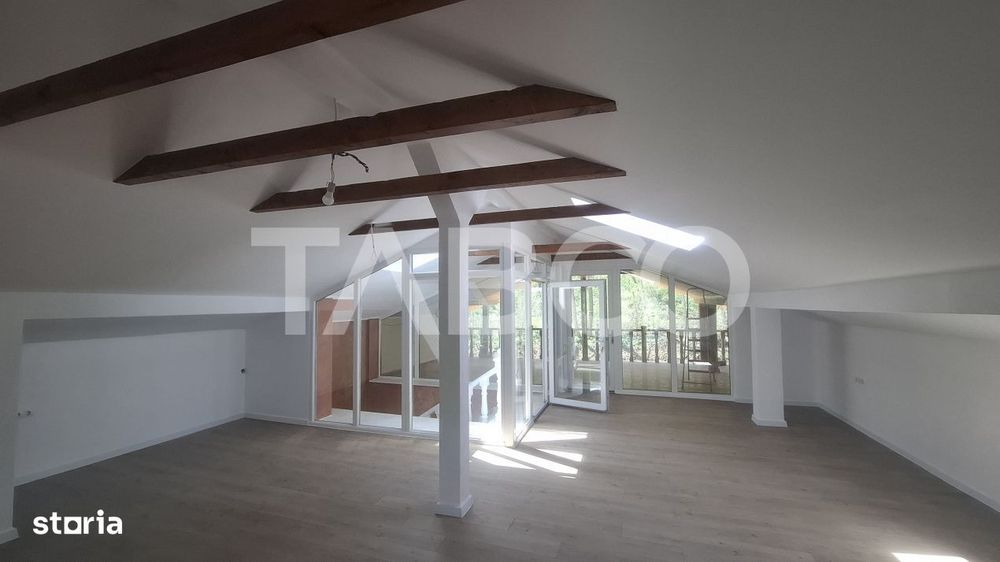Casa de vanzare 405 mp utili 2 garaje 250 mp terase Slimnic Sibiu