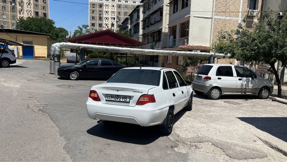 Nexia 2  2010 yil oq rang
