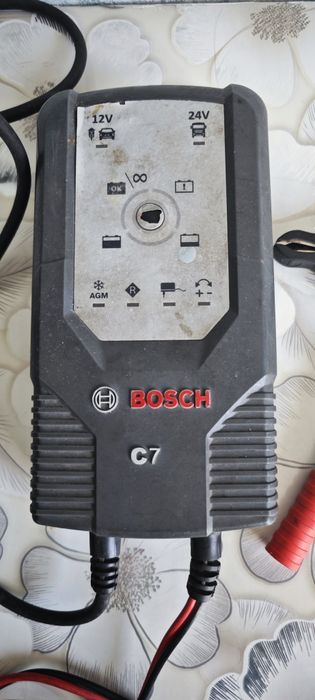 Продам зарядное Bosch c7