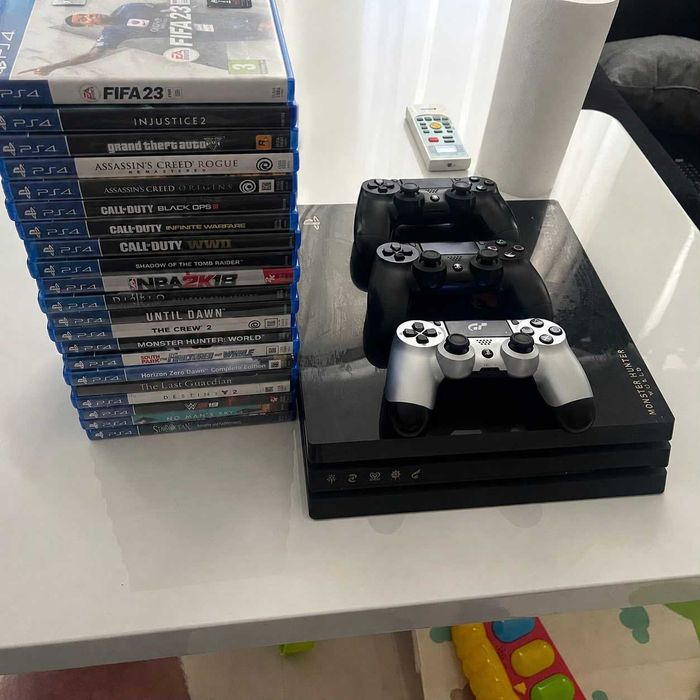 PS4 Pro 1TB + 3 manete originale + 21 jocuri – Pachet complet