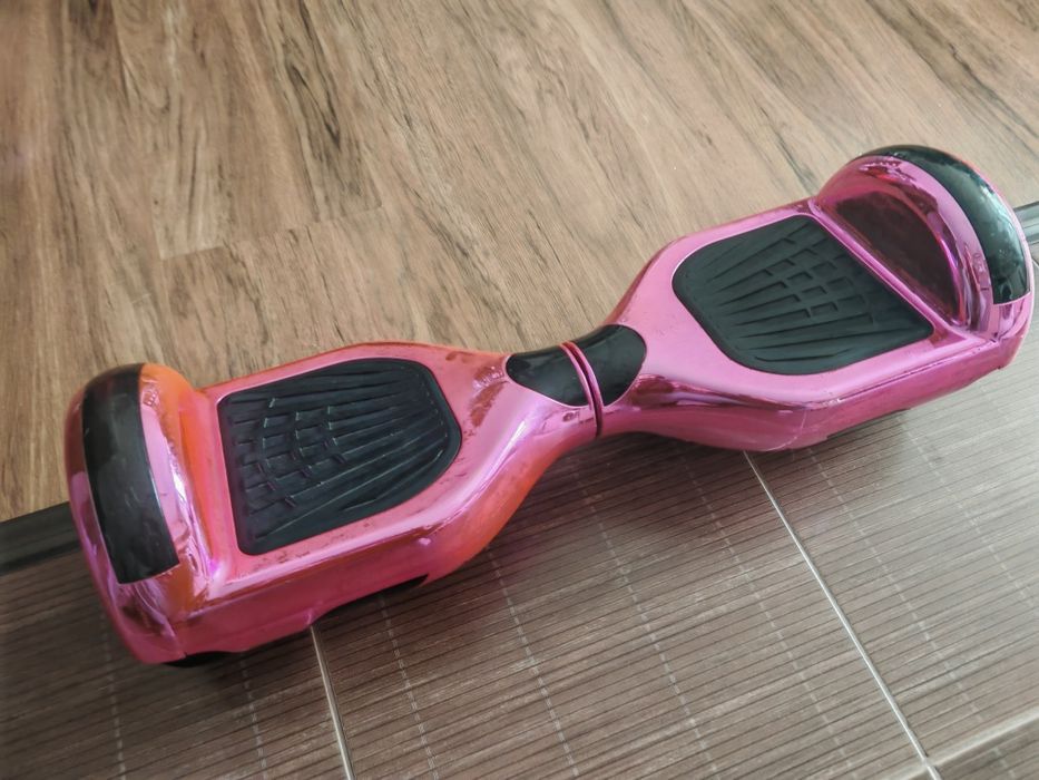 Vând hoverboard roz-crom