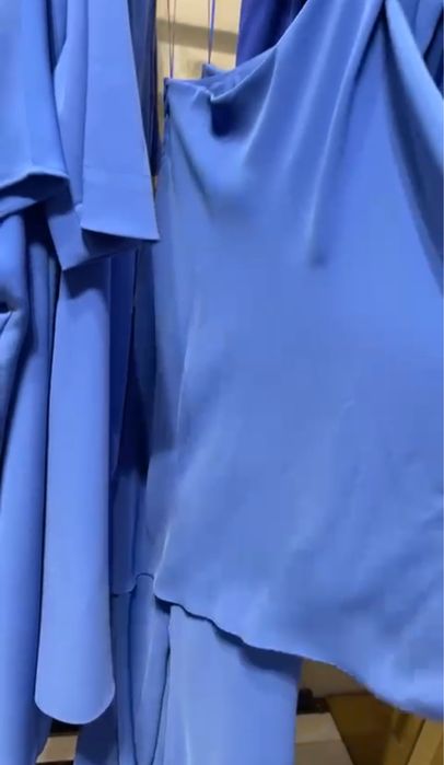 Вечерние платья и комбинезоны