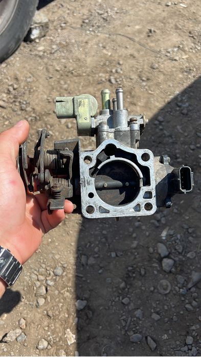 Дросельная заслонка карина е