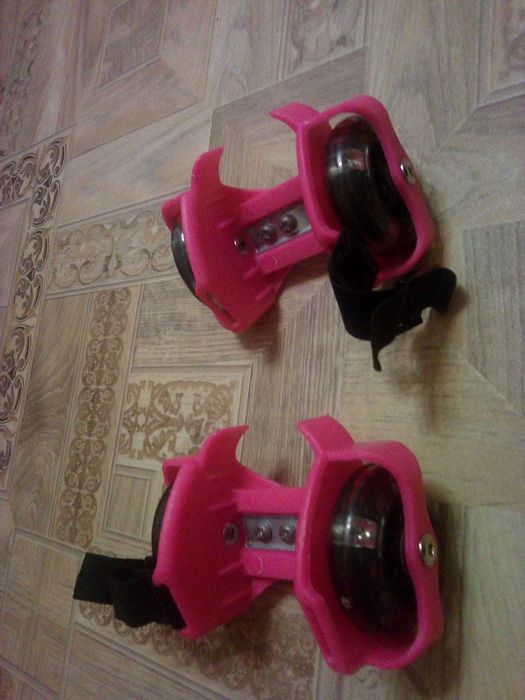 Роликовые коньки