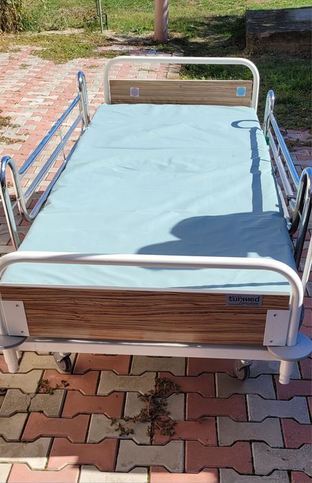 Pat electric cu telecomanda pentru persoane cu dizabilități .