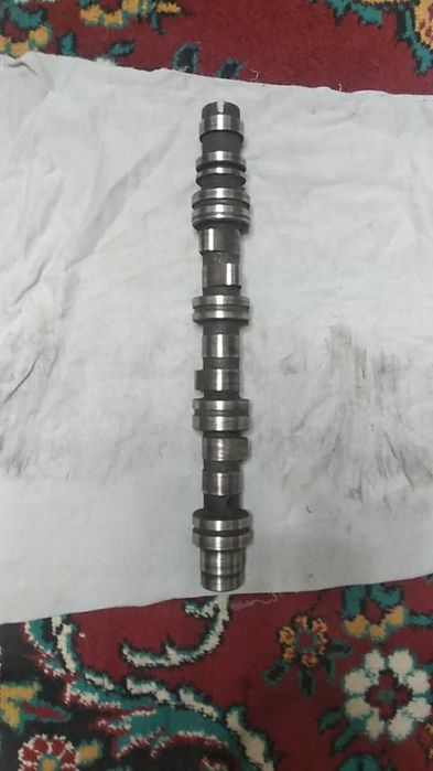 Продаётся распредвал от Дамас новый. и диск от колёс R-12