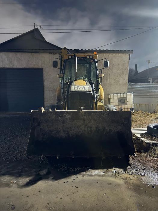 Экскаватор- погрузчик 3в 1