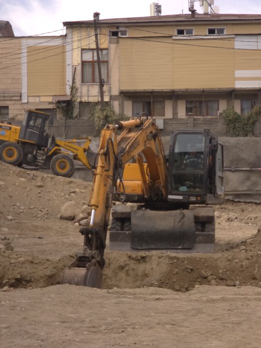 Экскаватор в аренду колесный г. Алматы