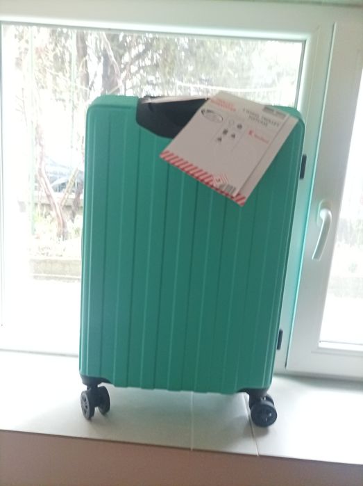 Passenger куфар за пътуване