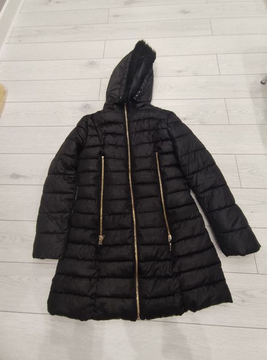 Продам теплую куртку