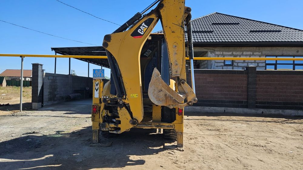 Экскаватор погрузчик