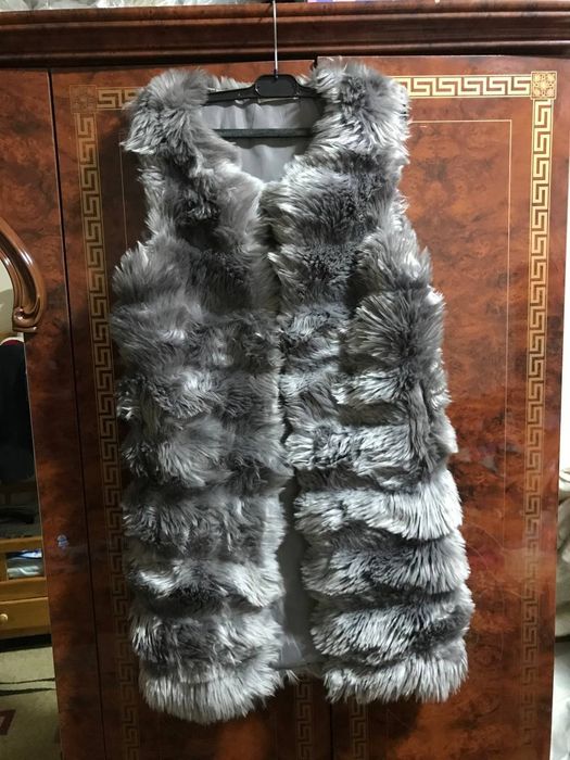 Меховая новая жилетка