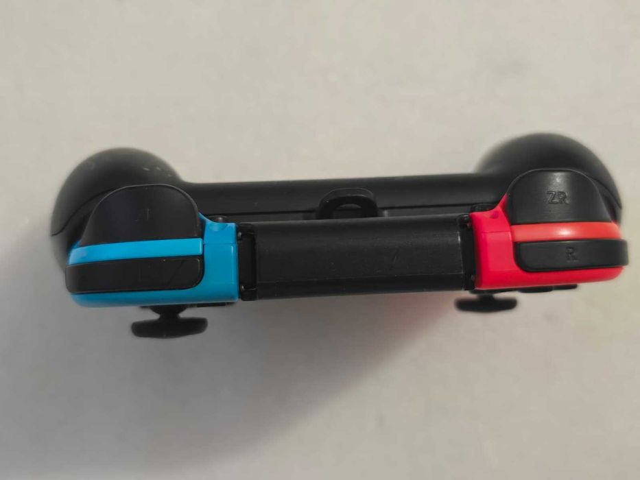 Controller Nintendo Switch Joy-Con Grip Kit (Joy-Con Albastru/Roșu Neon + Suport Grip)