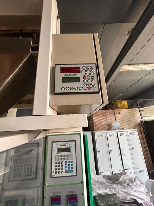 Индустриална вертикална вакуумна опаковъчна машина Dolzan Impianti, модел DSV 150/2, Италия