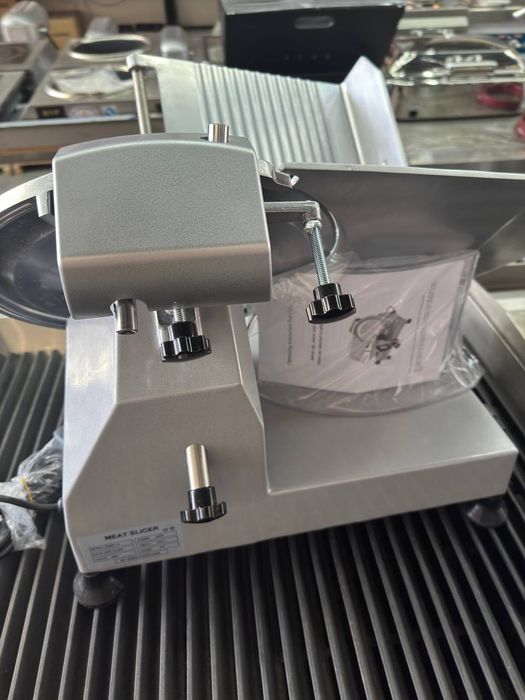 Слайсер апарати сотилади