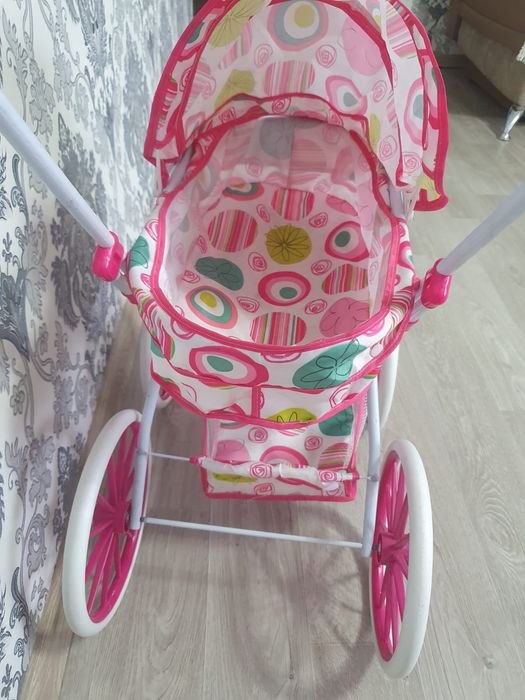 Игрушечная детская коляска