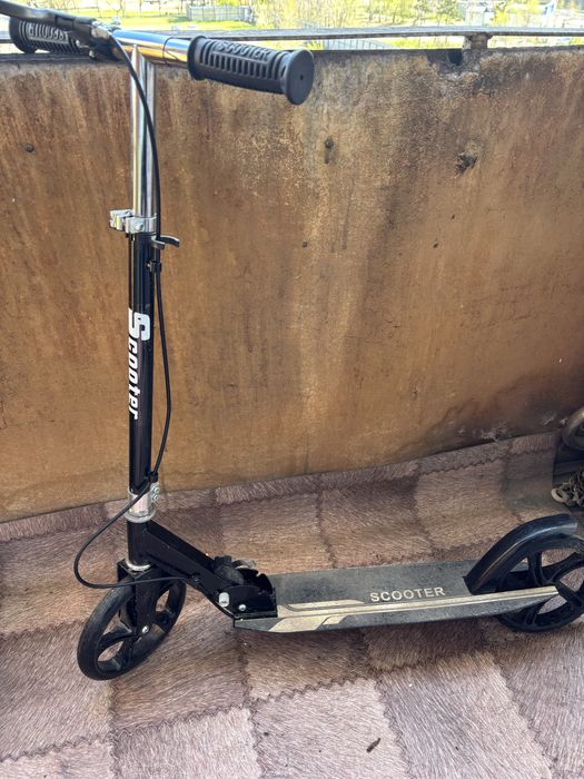 Продам самокат с доской