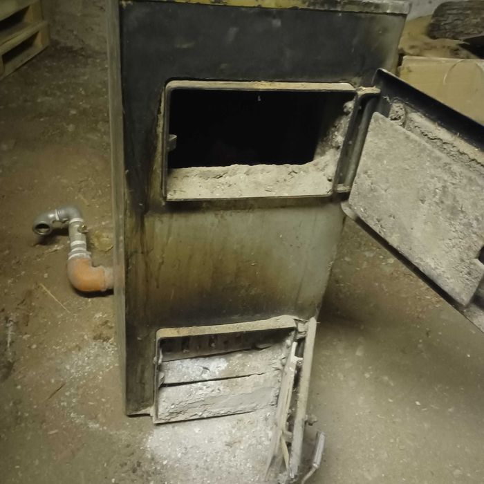 Продавам камина с водна риза на дърва 16кW руска.