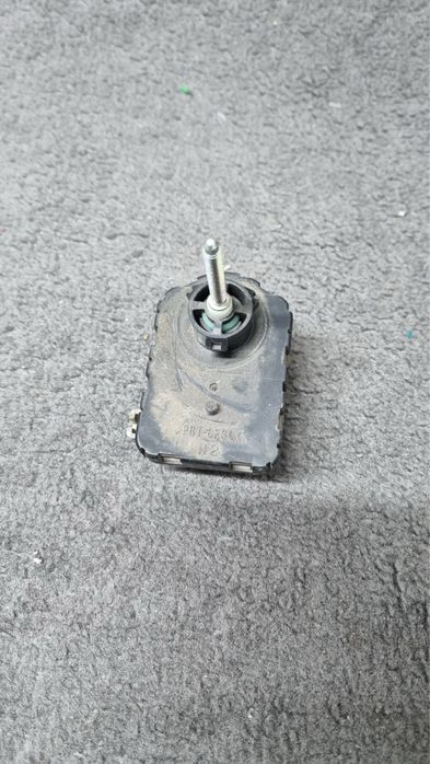 Корректор моторчик фар koito Toyota