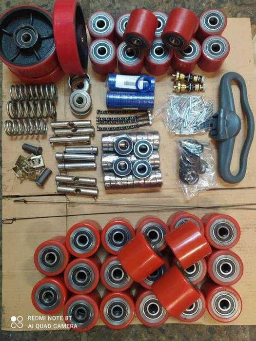 запчасти для рохли гидравлич. тележек ролик вилки палец  ручки сальник