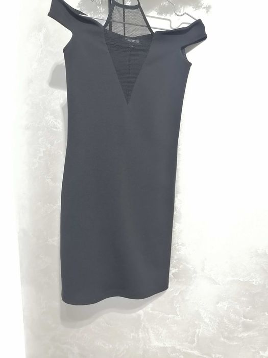 рокля на Totaly erected