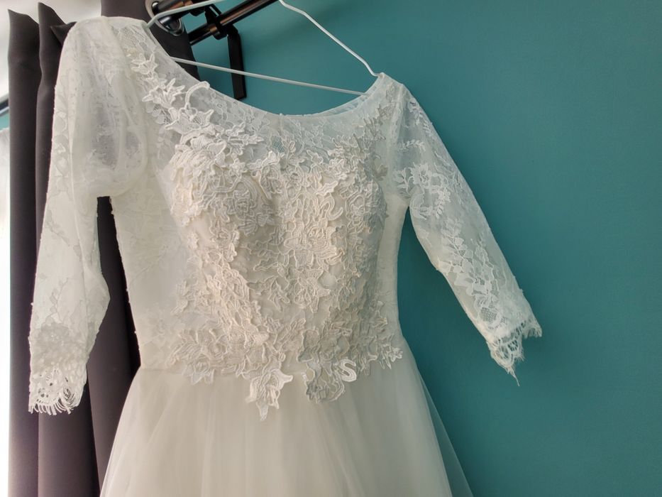 Rochie de mireasa nepurtata niciodata