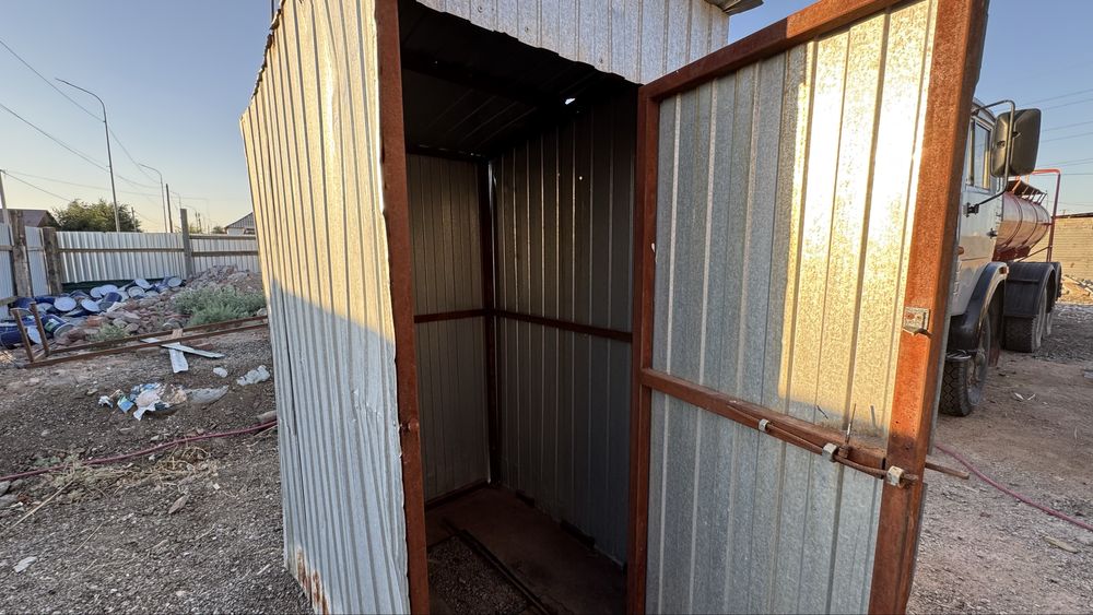 Продам землю с постройкой