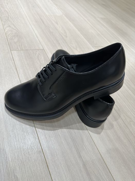 Оригинальные туфли от бренда Prada