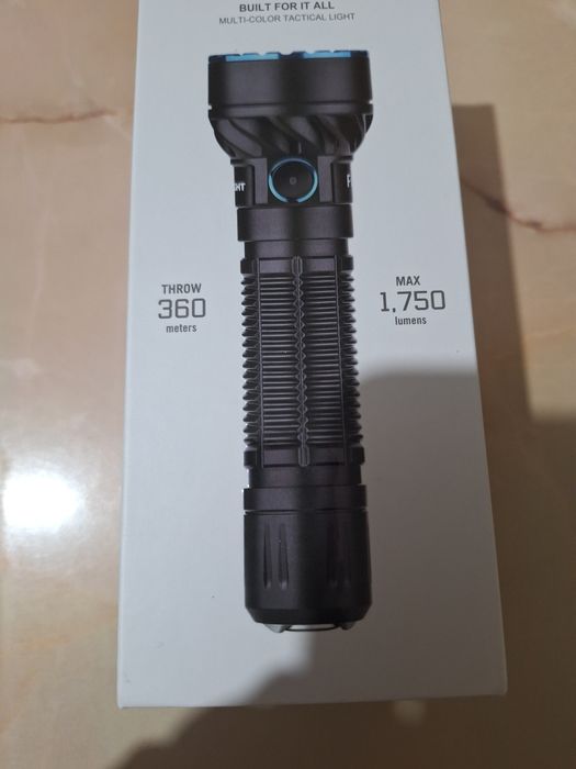 Vand lanterna Olight Freyr,noua