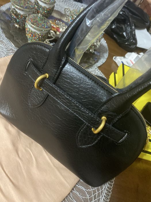 Geanta noua, Miu Miu