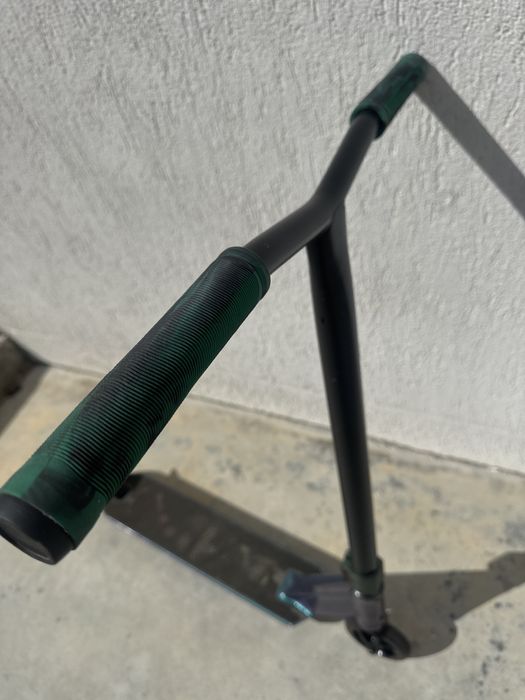 Trotinata freestyle whip Champ