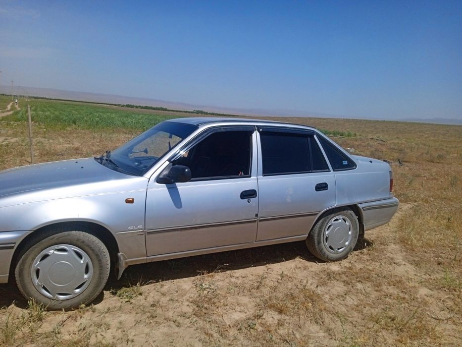 Neksiya sons lyuks konditsioner 2003