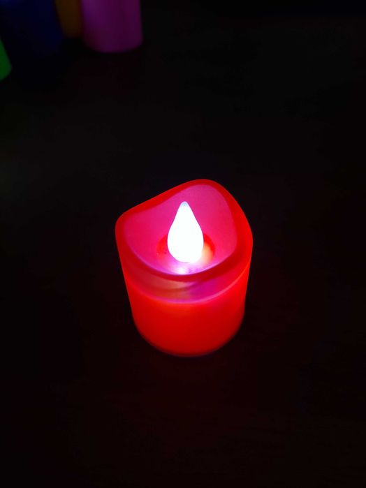 Новые электронные свечи со светомузыкой разноцветные