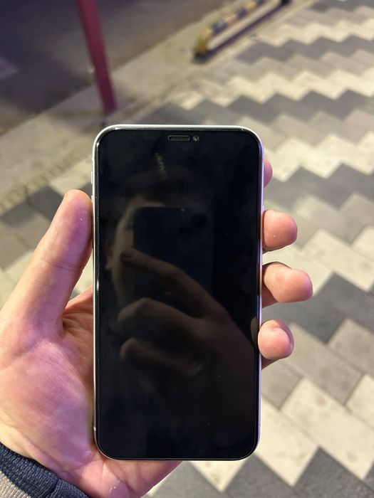 iPhone Xr oq tiniq ochilmagan