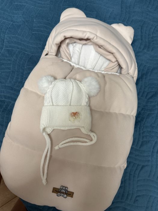 Продам конверт теплый с комбинезоном