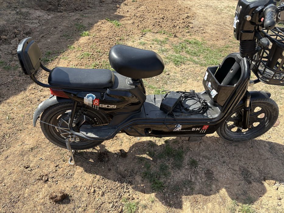 Электроный скутер