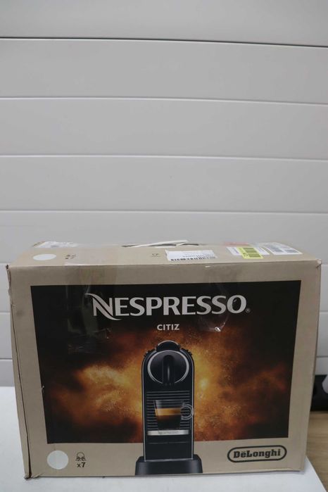 Капсулна машина De'Longhi Nespresso с помпа за високо налягане и перфектен контрол на топлината. Функция за пестене на енергия, без Aeroccino.