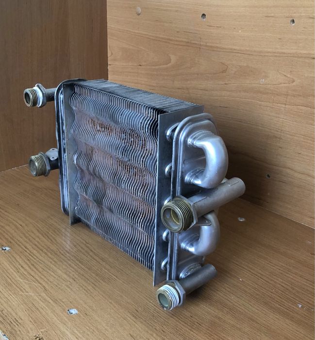 Продам теплообменник на Рига 18w