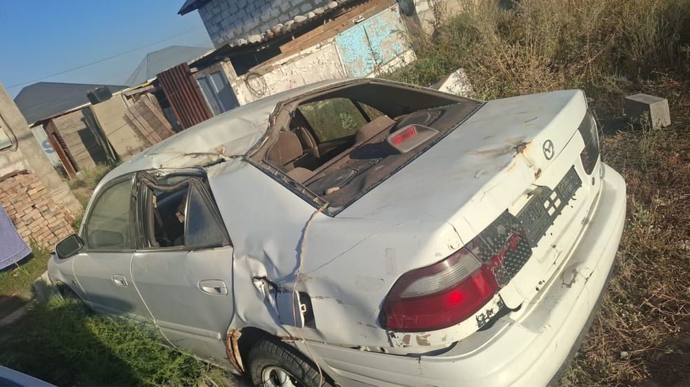 Мазда 626 птичка