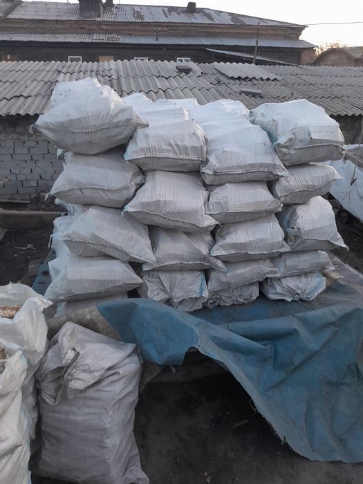 Дрова в мешках рубленные