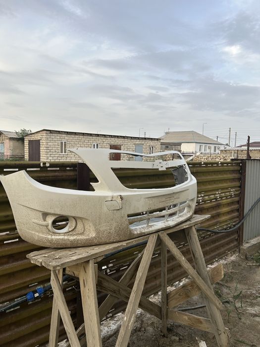 Передний бампер chevrolet