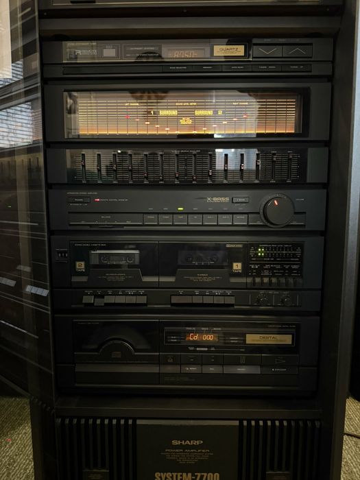 Система Sharp 7700